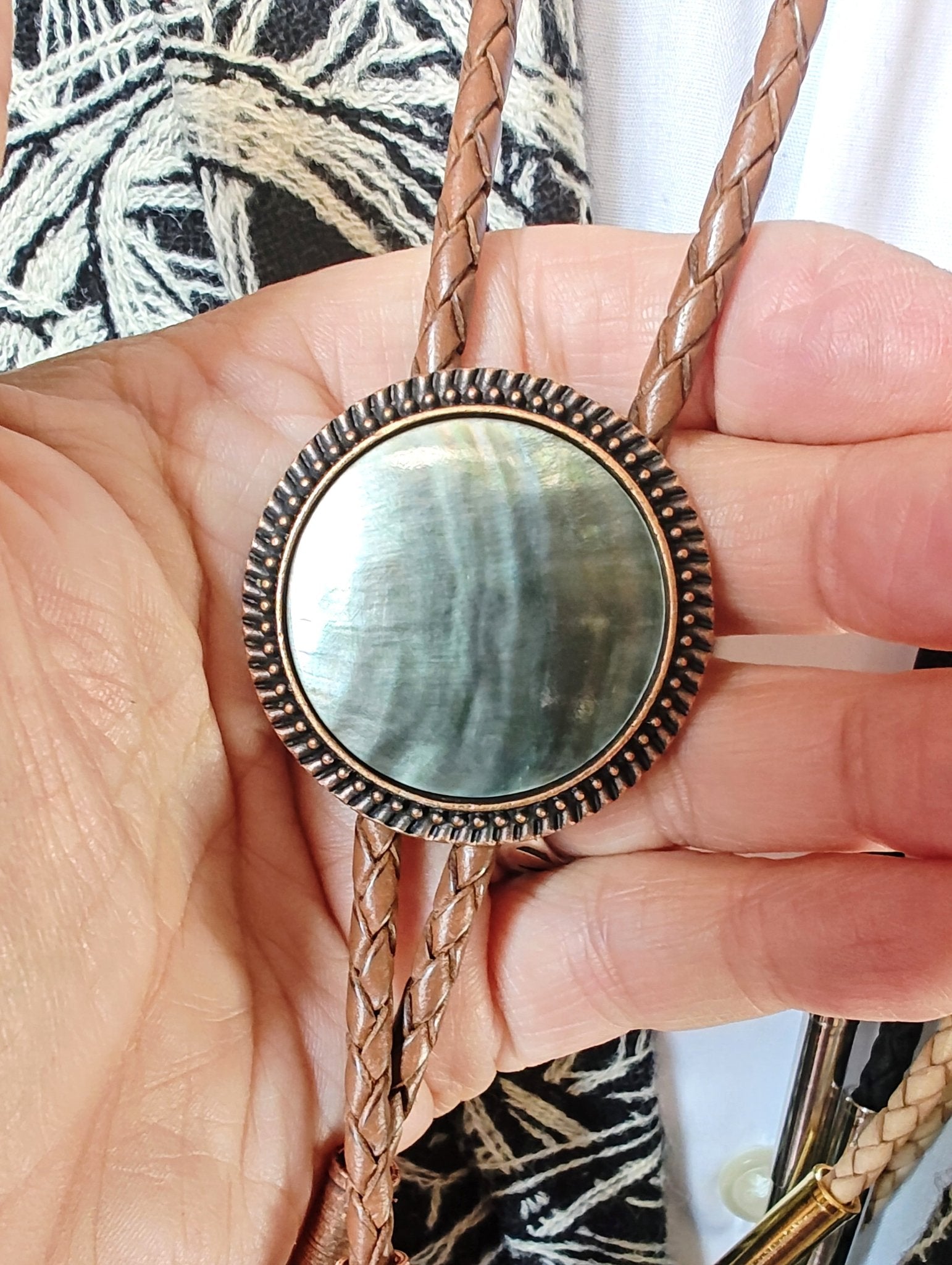 Bolo Tie with Black Mother Of Pearl in Round Up Gold, Silver or Copper Setting - Folks On The Edge