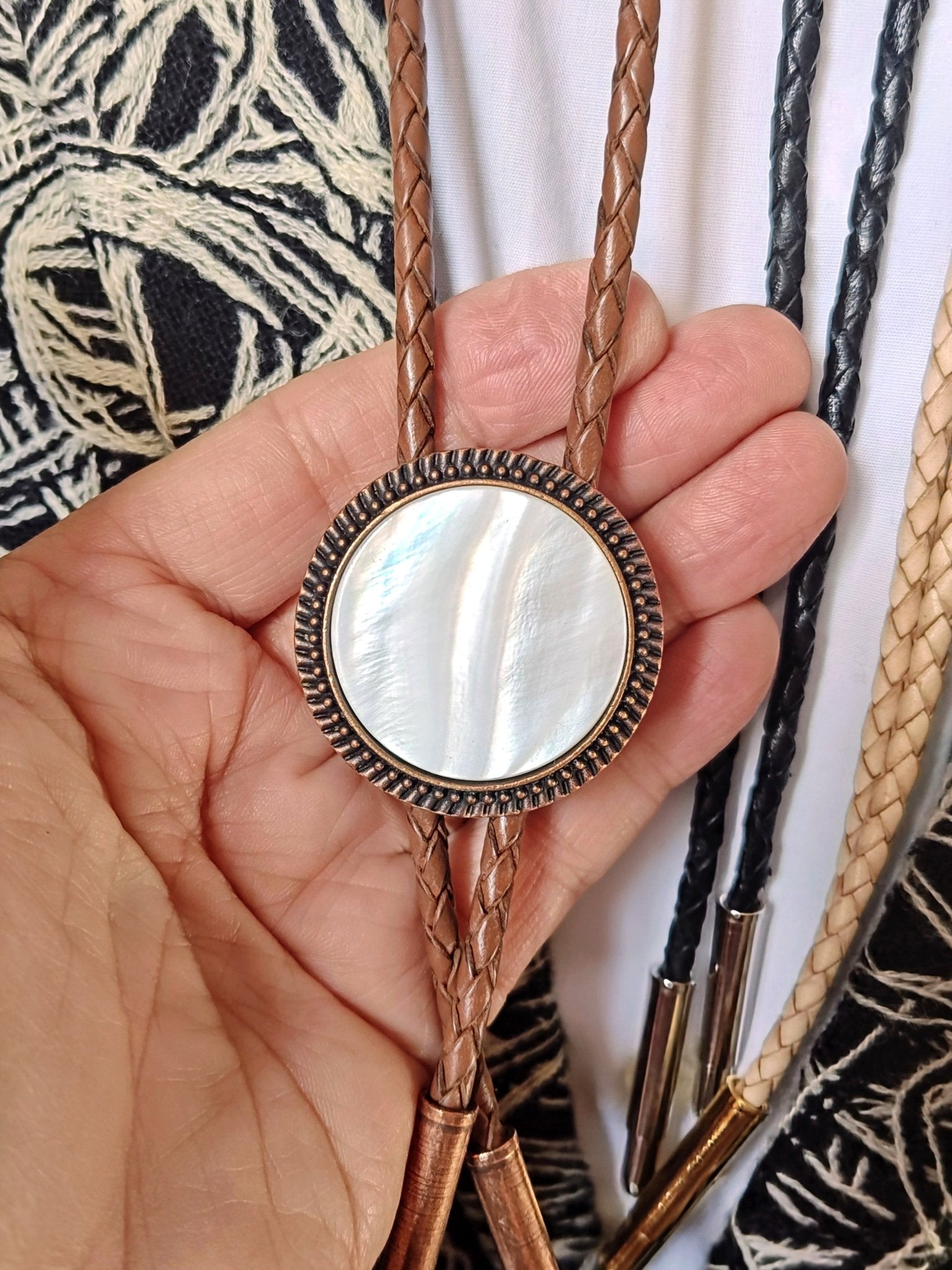 Bolo Tie with White Mother Of Pearl in Round Up Gold, Silver or Copper Setting - Folks On The Edge