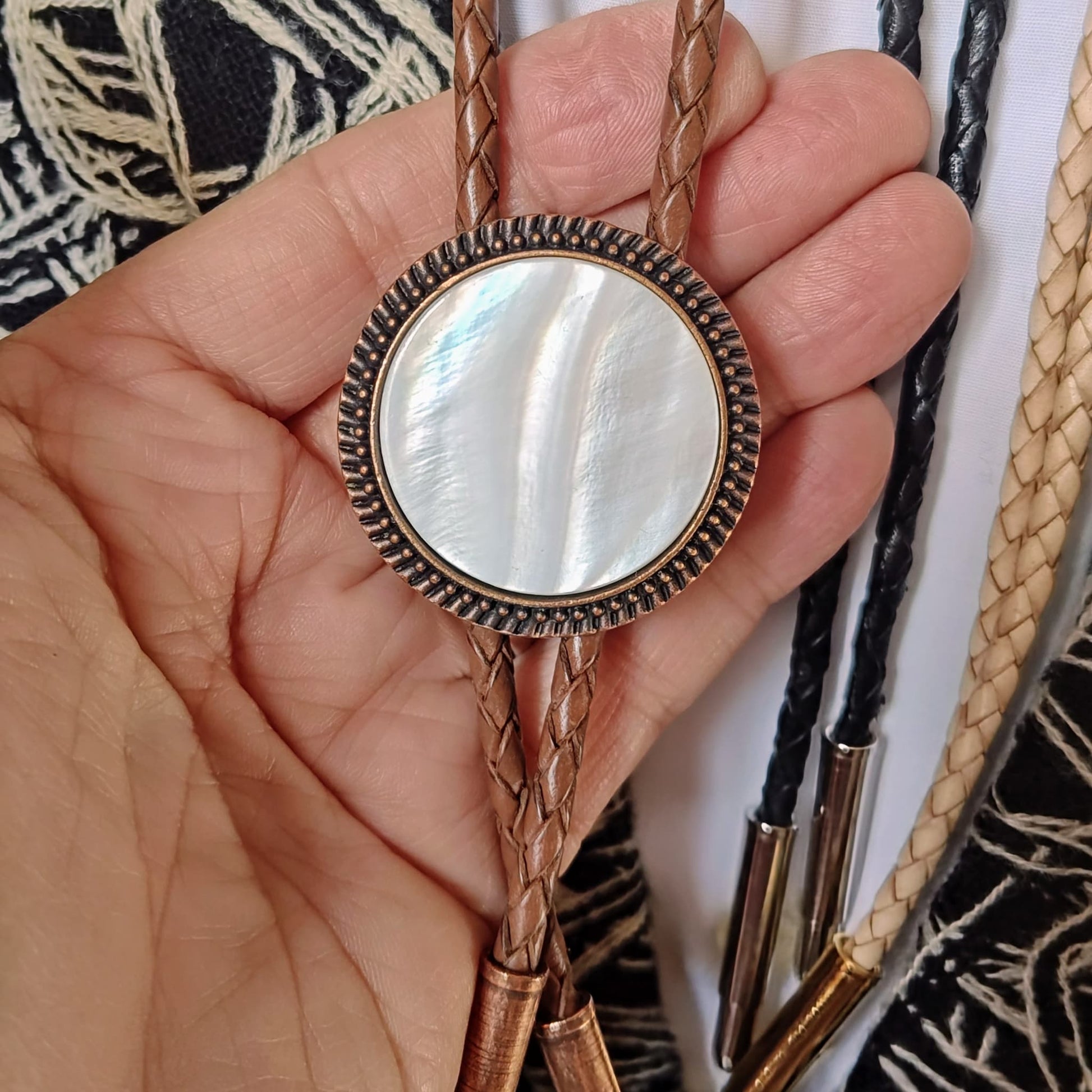 Bolo Tie with White Mother Of Pearl in Round Up Gold, Silver or Copper Setting - Folks On The Edge